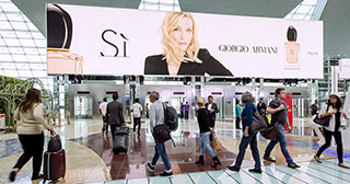 Billboard of Sì by Giorgio Armani, Dubai Airport